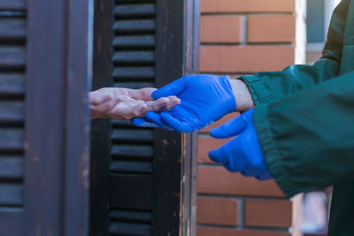 Close-up of hand holding metal