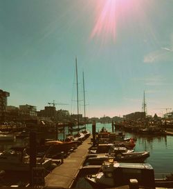 Boats moored at harbor