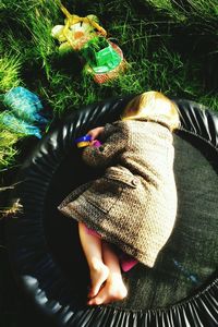 Woman relaxing on grass