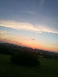 Scenic view of landscape against sky during sunset