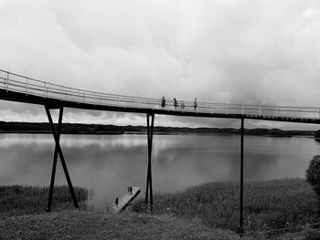 Bridge over river against sky