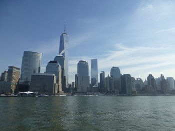 View of buildings in city against sky