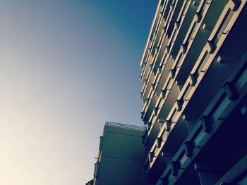 Low angle view of buildings against clear sky