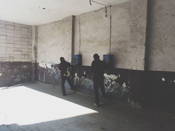 Full length of woman standing in pond