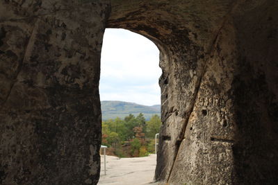 View of arched wall against sky