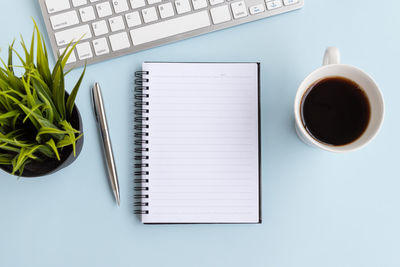 High angle view of coffee cup on table