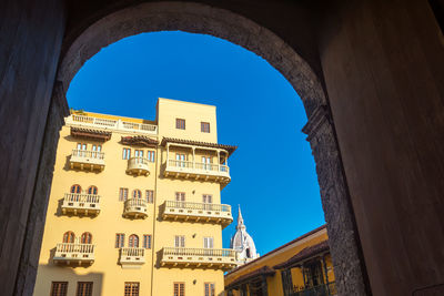 Low angle view of cartagena cathedral dome seen from archway