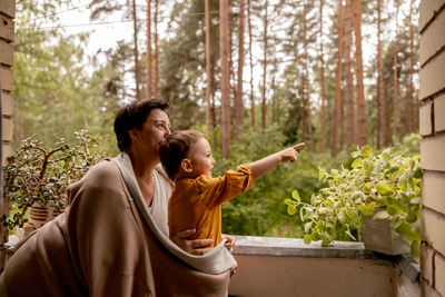 Happy grandmother and grandson enjoy time together. positive middle age woman 