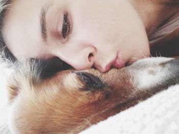 Close-up portrait of woman with dog