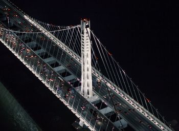 High angle view of illuminated suspension bridge at night