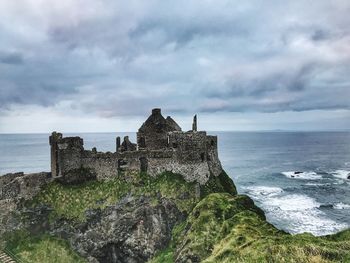 Panoramic view of sea against cloudy sky