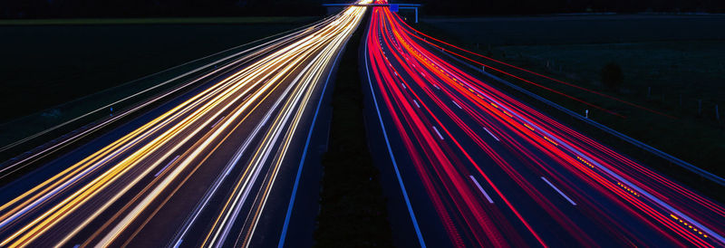 Light trails on road at night