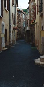 Narrow alley along buildings