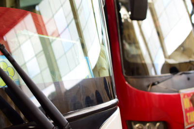 Close-up of red vintage car