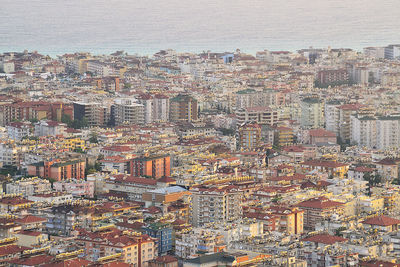 Aerial view of cityscape against sky