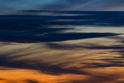 Low angle view of dramatic sky during sunset