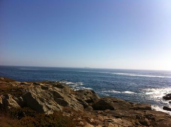 Scenic view of sea against clear sky