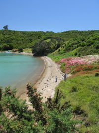 Scenic view of land against clear blue sky