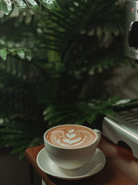 Coffee cup on table