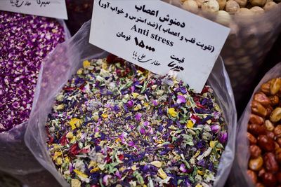 Various flowers for sale at market stall