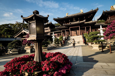 View of temple against building