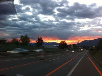 Road against sky during sunset