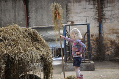 Full length of girl with arms raised