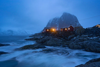 Scenic view of sea against sky at dusk