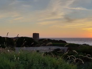 Scenic view of sea against sky during sunset