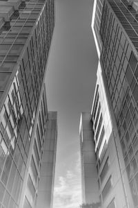 Low angle view of modern buildings against sky