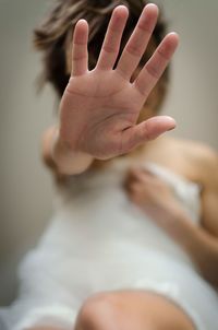 Woman gesturing stop sign