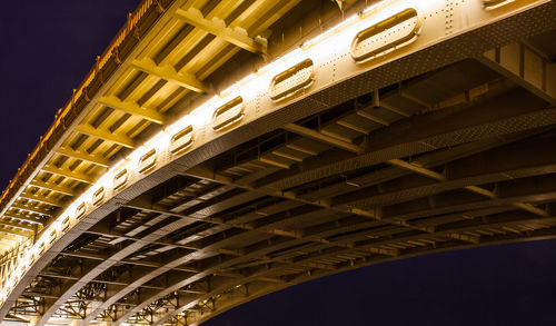 Low angle view of illuminated city at night