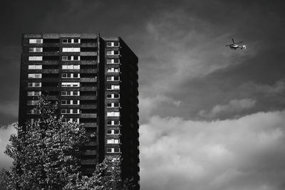 Low angle view of modern building against sky