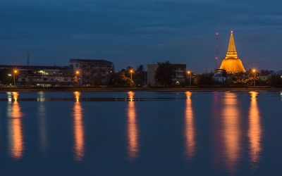 Illuminated city lit up at night