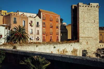 Torre dell elefante by buildings against clear sky