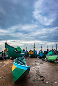 Fishing boats at sea shore in the morning