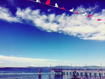 Scenic view of sea against blue sky