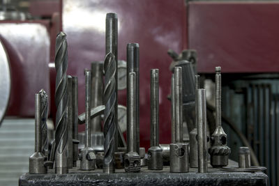 Close-up of tools arranged in factory