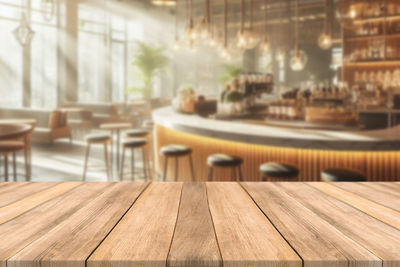 Close-up of wooden table at restaurant