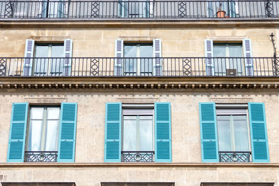 Typical architectural features of parisian buildings. stone facade with blu zinc plates roof