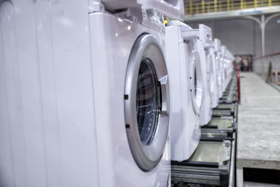 Row of washing machines at factory