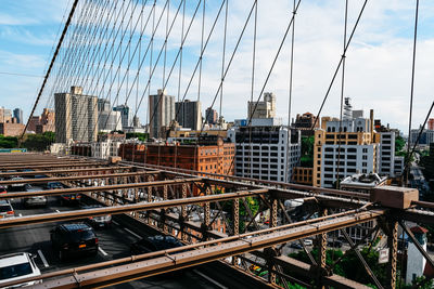 Cars on bridge in city