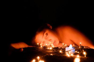 Woman standing at night