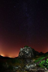 Scenic view of star field against sky at night