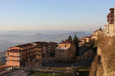 High angle view of buildings in city against sky