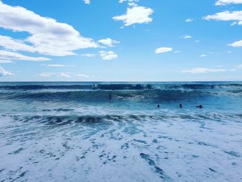 Scenic view of sea against blue sky