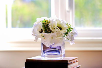 Close-up of flower vase on table