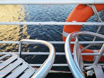 Close-up of sailboat sailing on sea