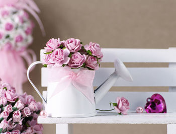 Close-up of pink flowers on table