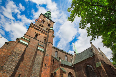 Low angle view of historic building against sky